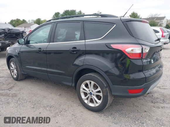 2017 Ford Escape SE with VIN 1FMCU9GD0HUC58128, listed as a IAAI auction lot 42078045 with 125,503 mi miles. Bid and sale history available at carsss.com. Image 3.
