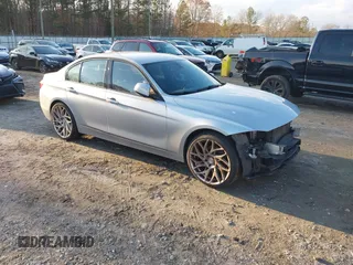 2016 BMW 3 Series 328i with VIN WBA8E9G50GNT47543, listed as a IAAI auction lot 41101803 with 150,202 mi miles. Bid and sale history available at carsss.com. Image 1.