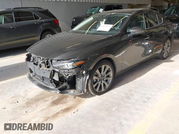 2023 Mazda 3 S Premium with VIN 3MZBPBDM5PM374492, listed as a IAAI auction lot 42025207 with 12,344 mi miles and . Bid and sale history available at DreamBid. Image 6.