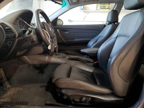 2009 BMW 1 Series 135i with VIN WBAUC735X9VK95095, listed as a Copart auction lot 41905345 with 119,565 mi miles and Salvage Title. Bid and sale history available at carsss.com. Image 7.