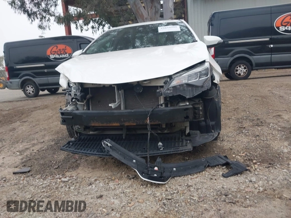 2019 Toyota Corolla L with VIN 5YFBURHE3KP895705, listed as a IAAI auction lot 42034995 with 173,719 mi miles and . Bid and sale history available at DreamBid. Image 13.
