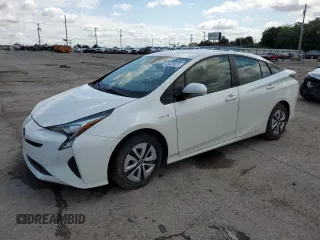 2018 Toyota Prius Two z VIN JTDKBRFUXJ3062362, wystawiony jako Copart lot #63425874 z przebiegiem 162 372 mil mil oraz Czysty tytuł • Clean title. Historia ofert i sprzedaży dostępna na DreamBid. Obrazek 1.