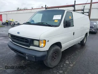 1998 Ford Econoline Cargo with VIN 1FTRE146XWHA45793, listed as a IAAI auction lot 41921474 with 168,307 mi miles and . Bid and sale history available at DreamBid. Image 2.