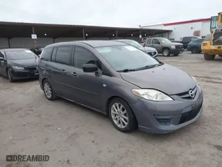 2009 Mazda Mazda5 Sport with VIN JM1CR293090341908, listed as a IAAI auction lot 41732593 with 285,560 mi miles. Bid and sale history available at carsss.com. Image 1.
