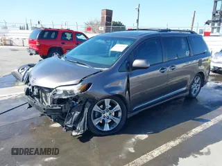2012 Toyota Sienna SE with VIN 5TDXK3DCXCS233593, listed as a IAAI auction lot 41959611 with 85,558 mi miles. Bid and sale history available at carsss.com. Image 18.