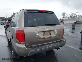 2004 Honda Pilot EX with VIN 2HKYF18604H582741, listed as a IAAI auction lot 41572039 with 225,101 mi miles. Bid and sale history available at carsss.com. Image 16.