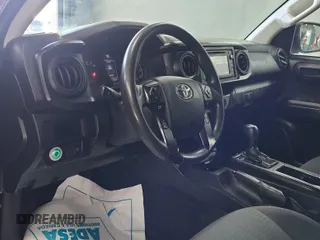 2019 Toyota Tacoma SR with VIN 5TFRX5GN1KX143485, listed as a IAAI auction lot 42763045 with 90,847 mi miles and . Bid and sale history available at DreamBid. Image 4.