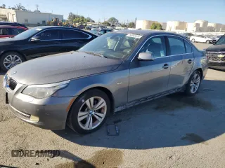 2009 BMW 5 Series 528i with VIN WBANU53519C119831, listed as a Copart auction lot 76983424 with 177,210 mi miles and Salvage Title. Bid and sale history available at carsss.com. Image 1.