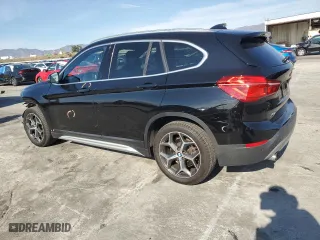 2019 BMW X1 sDrive28i with VIN WBXHU7C59K5N01520, listed as a Copart auction lot 44910215 with 44,239 mi miles and Salvage Title. Bid and sale history available at carsss.com. Image 2.