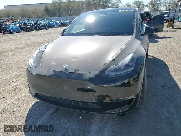 2023 Tesla Model Y Performance with VIN 7SAYGDEF7PF924355, listed as a Copart auction lot 47877055 with 64,663 mi miles and Salvage Title. Bid and sale history available at DreamBid. Image 11.