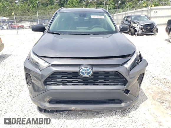 2023 Toyota RAV4 Hybrid LE with VIN JTMLWRFV8PD200078, listed as a Copart auction lot 57490185 with 67,321 mi miles and Salvage title. Bid and sale history available at DreamBid. Image 5.