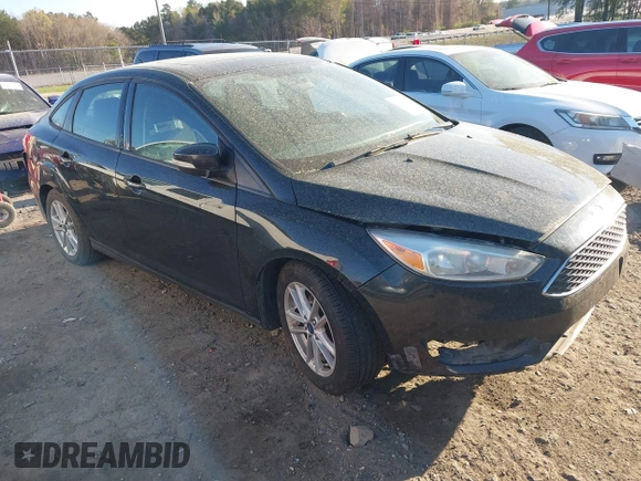 2015 Ford Focus SE with VIN 1FADP3F29FL210973, listed as a IAAI auction lot 41874367 with 128,705 mi miles. Bid and sale history available at carsss.com. Image 1.