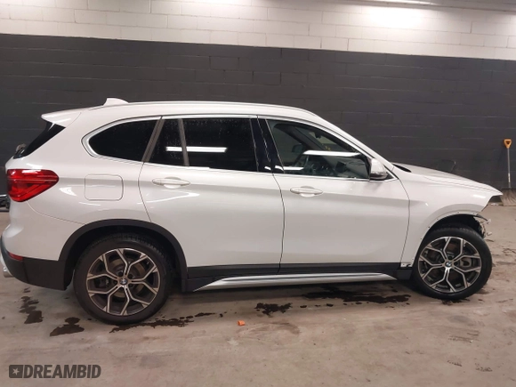 2021 BMW X1 xDrive28i with VIN WBXJG9C0XM5T76975, listed as a IAAI auction lot 41310115 with 26,869 mi miles. Bid and sale history available at carsss.com. Image 14.