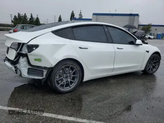 2023 Tesla Model 3 with VIN 5YJ3E1EA8PF477857, listed as a Copart auction lot 44958805 with 0 mi miles and Salvage Title. Bid and sale history available at carsss.com. Image 3.