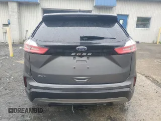 2021 Ford Edge SEL z VIN 2FMPK3J98MBA50555, wystawiony jako Copart lot #58509445 z przebiegiem 114 188 mil mil oraz Czysty tytuł • Clean title. Historia ofert i sprzedaży dostępna na DreamBid. Obrazek 6.