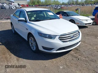 2018 Ford Taurus SEL z VIN 1FAHP2E87JG115461, wystawiony jako IAAI lot #42236562 z przebiegiem 100 604 mil mil oraz . Historia ofert i sprzedaży dostępna na DreamBid. Obrazek 1.