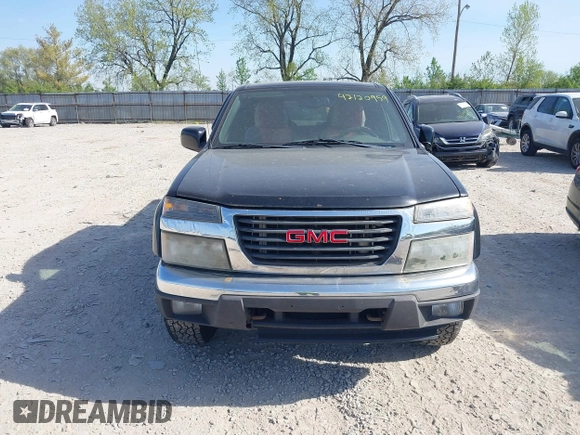 2011 GMC Canyon SLE1 with VIN 1GTH6MFE5B8104838, listed as a IAAI auction lot 42120959 with 188,277 mi miles. Bid and sale history available at carsss.com. Image 12.