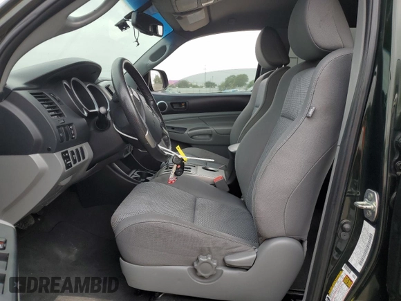2013 Toyota Tacoma PreRunner with VIN 3TMJU4GN9DM141945, listed as a Copart auction lot 64747625 with 130,793 mi miles and Salvage title. Bid and sale history available at DreamBid. Image 7.