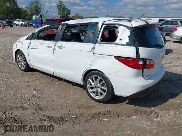2013 Mazda 5 Touring with VIN JM1CW2CLXD0151396, listed as a IAAI auction lot 40479013 with 118,314 mi miles and . Bid and sale history available at DreamBid. Image 3.