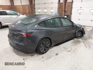 2025 Tesla Model 3 Long Range with VIN 5YJ3E1EB4SF913766, listed as a IAAI auction lot 41975164 with 3,099 mi miles and . Bid and sale history available at DreamBid. Image 4.