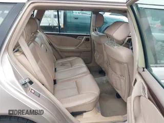 2000 Mercedes-Benz E 320 with VIN WDBJH65J8YA981779, listed as a IAAI auction lot 42107928 with 276,090 mi miles and . Bid and sale history available at DreamBid. Image 8.