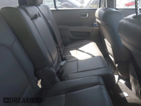 2012 Honda Pilot EX-L with VIN 5FNYF4H54CB041911, listed as a IAAI auction lot 41968540 with 124,646 mi miles and . Bid and sale history available at DreamBid. Image 8.
