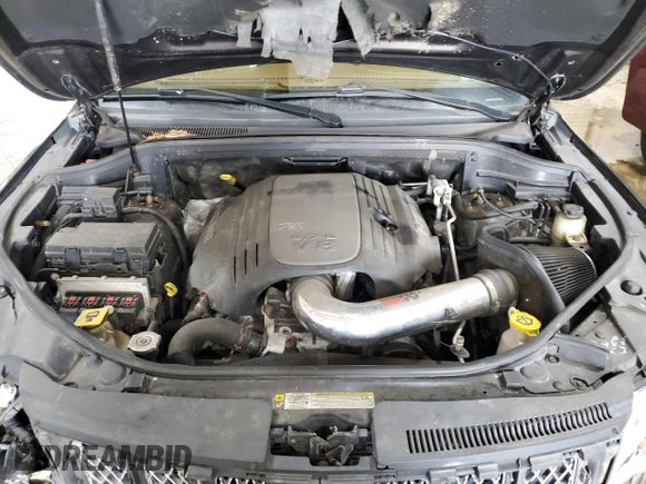 2013 Jeep Grand Cherokee Overland with VIN 1C4RJFCT7DC587329, listed as a Copart auction lot 53432625 with 98,938 mi miles and Salvage Title. Bid and sale history available at carsss.com. Image 12.