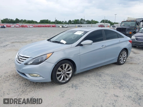 2012 Hyundai Sonata Limited z VIN 5NPEC4AB5CH402785, wystawiony jako IAAI lot #42350650 z przebiegiem 145 648 mil mil oraz . Historia ofert i sprzedaży dostępna na DreamBid. Obrazek 2.