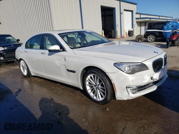 2013 BMW 7 Series 750i with VIN WBAYA8C55DC996693, listed as a Copart auction lot 80233423 with 140,925 mi miles and Salvage Title. Bid and sale history available at DreamBid. Image 4.
