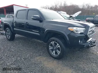 2016 Toyota Tacoma SR with VIN 3TMCZ5AN5GM041970, listed as a IAAI auction lot 41878678 with 115,181 mi miles. Bid and sale history available at carsss.com. Image 1.