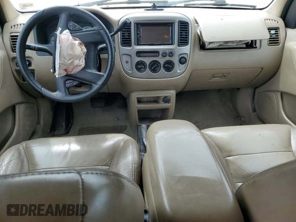 2003 Ford Escape XLT Popular with VIN 1FMCU03113KD48108, listed as a Copart auction lot 60978095 with 201,604 mi miles and Salvage title. Bid and sale history available at DreamBid. Image 8.