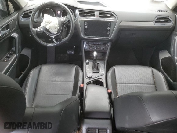 2020 Volkswagen Tiguan SE with VIN 3VV2B7AX4LM022562, listed as a Copart auction lot 69816034 with 61,789 mi miles and Salvage Title. Bid and sale history available at DreamBid. Image 8.