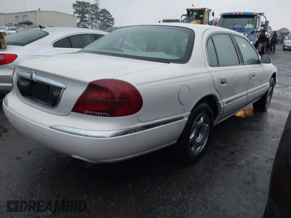 2001 Lincoln Continental with VIN 1LNHM97V51Y670610, listed as a IAAI auction lot 41439804 with 160,114 mi miles and . Bid and sale history available at DreamBid. Image 4.
