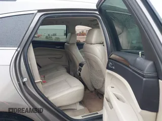 2011 Cadillac SRX Premium Collection with VIN 3GYFNFEY3BS610591, listed as a IAAI auction lot 41446148 with 147,959 mi miles. Bid and sale history available at carsss.com. Image 8.