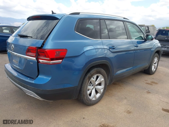 2019 Volkswagen Atlas 3.6L V6 SE w/Technology with VIN 1V2WR2CA4KC577548, listed as a IAAI auction lot 41964877 with 74,361 mi miles. Bid and sale history available at carsss.com. Image 4.