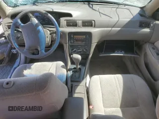 2001 Toyota Camry CE z VIN JT2BG22K410568101, wystawiony jako Copart lot #57184125 z przebiegiem Nie podano mil oraz Szkoda całkowita • Salvage title. Historia ofert i sprzedaży dostępna na DreamBid. Obrazek 8.