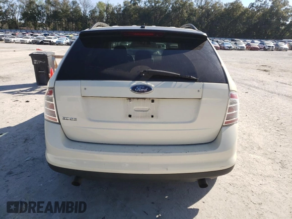 2007 Ford Edge SE z VIN 2FMDK36C27BB03987, wystawiony jako Copart lot #46288005 z przebiegiem 191 680 mil mil oraz Tytuł czysty. Historia ofert i sprzedaży dostępna na DreamBid. Obrazek 6.