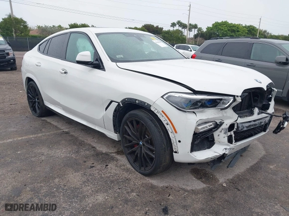 2021 BMW X6 xDrive40i with VIN 5UXCY6C00M9F88215, listed as a IAAI auction lot 41646498 with 43,587 mi miles. Bid and sale history available at carsss.com. Image 1.