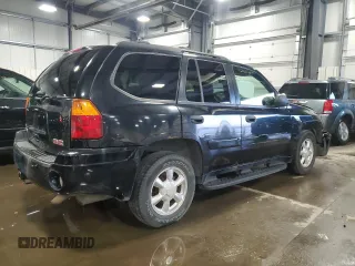 2004 GMC Envoy SLT with VIN 1GKDT13S642191868, listed as a Copart auction lot 82334304 with 150,810 mi miles and Salvage Title. Bid and sale history available at carsss.com. Image 3.