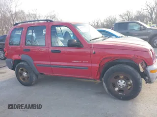 2003 Jeep Liberty Sport with VIN 1J4GL48K33W729642, listed as a IAAI auction lot 41826761 with 196,989 mi miles. Bid and sale history available at carsss.com. Image 6.