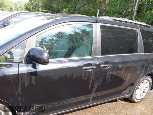 2015 Toyota Sienna XLE with VIN 5TDYK3DC8FS574645, listed as a IAAI auction lot 42528851 with 164,408 mi miles and . Bid and sale history available at DreamBid. Image 15.