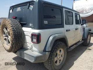 2018 Jeep Wrangler Unlimited Sport S with VIN 1C4HJXDG8JW127299, listed as a IAAI auction lot 42091561 with 116,082 mi miles and . Bid and sale history available at DreamBid. Image 4.