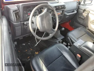 1999 Jeep Wrangler SE with VIN 1J4FY29P7XP410255, listed as a Copart auction lot 47207675 with 181,946 mi miles and Salvage Title. Bid and sale history available at carsss.com. Image 8.