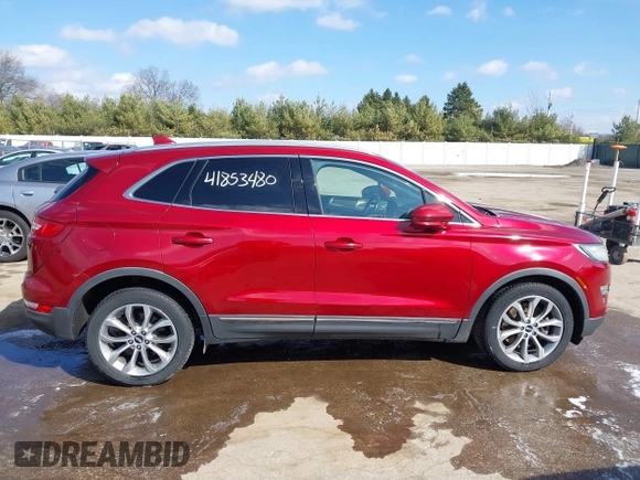 2015 Lincoln MKC z VIN 5LMCJ1A90FUJ32652, wystawiony jako IAAI lot #41853480 z przebiegiem 110 219 mil mil oraz . Historia ofert i sprzedaży dostępna na DreamBid. Obrazek 13.