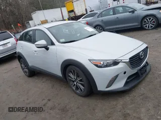2017 Mazda CX-3 Touring with VIN JM1DKFC77H0155101, listed as a IAAI auction lot 41722040 with 92,653 mi miles. Bid and sale history available at carsss.com. Image 1.