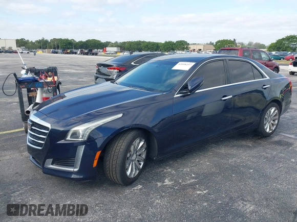 2016 Cadillac CTS RWD with VIN 1G6AP5SX8G0119984, listed as a IAAI auction lot 42098257 with 98,593 mi miles and . Bid and sale history available at DreamBid. Image 2.