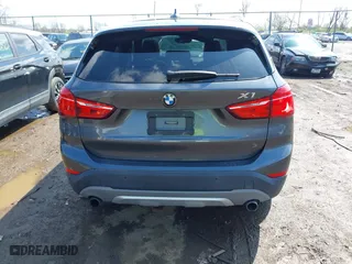 2016 BMW X1 xDrive28i with VIN WBXHT3C35GP886094, listed as a IAAI auction lot 42009639 with 61,739 mi miles. Bid and sale history available at carsss.com. Image 16.
