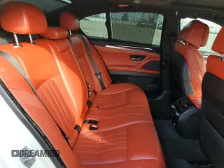 2015 BMW M5 z VIN WBSFV9C53FD595315, wystawiony jako Copart lot #39656653 z przebiegiem 85 869 mil mil oraz . Historia ofert i sprzedaży dostępna na DreamBid. Obrazek 10.