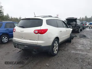 2011 Chevrolet Traverse LTZ with VIN 1GNKVLED5BJ385566, listed as a IAAI auction lot 40530314 with 166,155 mi miles and . Bid and sale history available at DreamBid. Image 4.