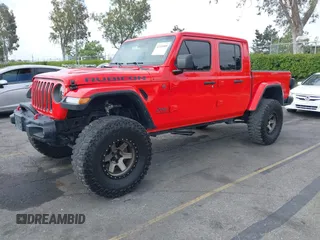 2021 Jeep Gladiator Rubicon with VIN 1C6JJTBGXML572976, listed as a IAAI auction lot 42134909 with 35,612 mi miles and . Bid and sale history available at DreamBid. Image 17.